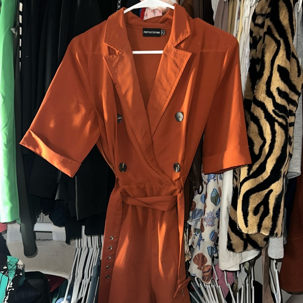 Belted romper Size 8/Medium. Lightweight fresh material.